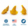 Four pieces of Best Bully Sticks Chicken Jerky on a white background.