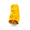 The Peanut Butter Beef Cheek - Medium by Best Bully Sticks, rich in collagen with a yellowish hue, is rolled and twisted and isolated on a white background.