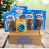 Christmas gift box featuring The BEST Holiday Treats &amp; Chews Box by Best Bully Sticks for your puppy&#39;s enjoyment.